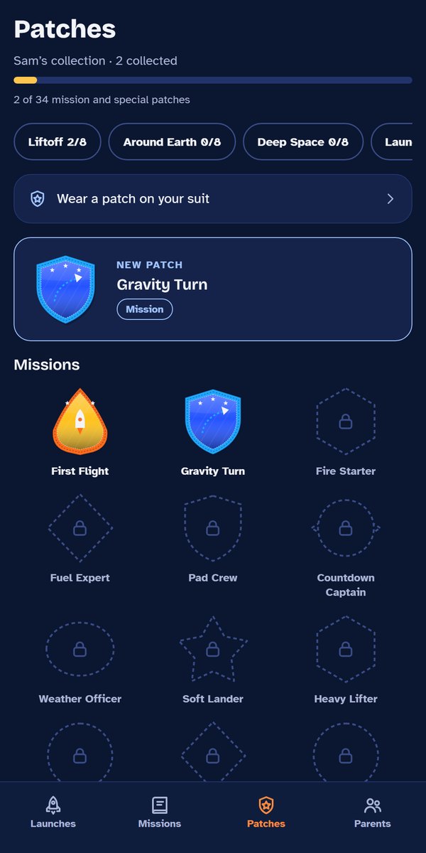 The Patches screen with the patches First Flight and Gravity Turn earned and more to unlock.